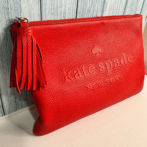 kate spade Handbags - Kate Spade Red Gia Larchmont Avenue Logo Pebble Leather Clutch w tassel - EUC